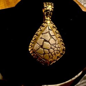 Beautiful gold and sterling silver pendant